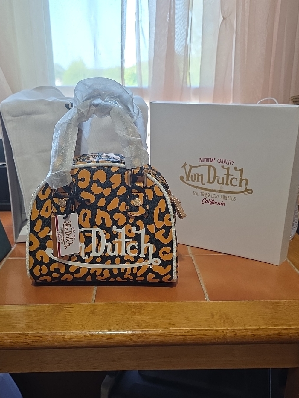 VON DUTCH "APRICOT CRUSH/BLACK BOWLING BAG CROSSBODY NIB